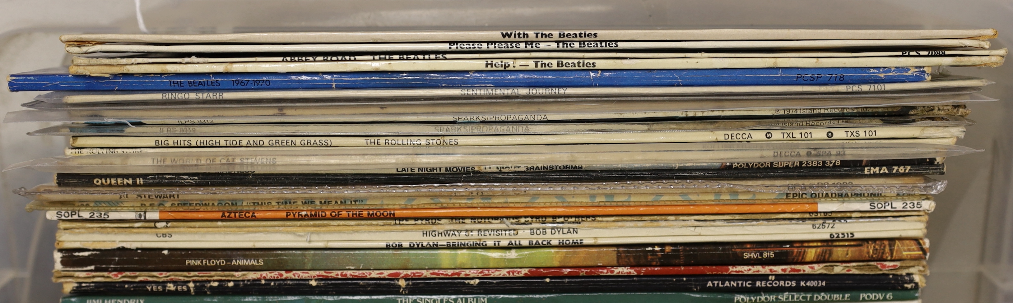 Thirty-six LP record albums, including The Beatles, The Rolling Stones, Pink Floyd, Cream, Jimi Hendrix, Joe Cocker, Elvis Presley, etc. plus six Beatles 7in. singles